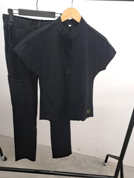 Black opulent scrub top